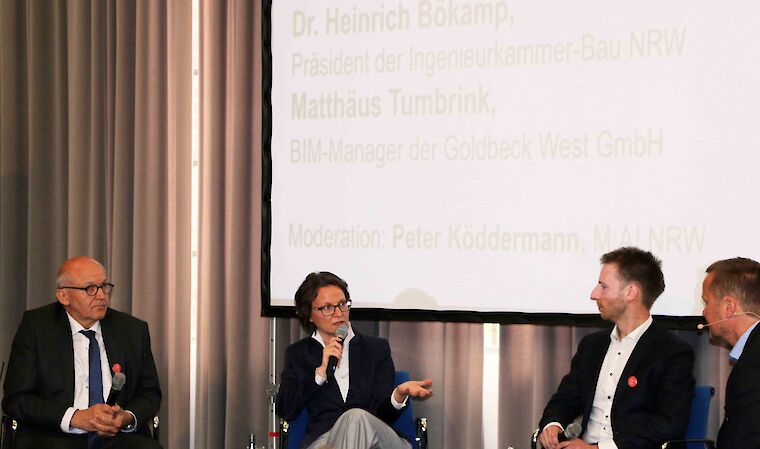 Betonte die Bedeutung der Digitalisierung des Bauens: Ina Scharrenbach, Ministerin für Heimat, Kommunales, Bau und Gleichstellung des Landes Nordrhein-Westfalen. Von links: Dr. Heinrich Bökamp, Präsident der Ingenieurkammer-Bau NRW, Matthäus Tumbrink, BIM-Manager der Firma Goldbeck West, Peter Köddermann, Kurator und Projektleiter des M:AI NRW. Foto: Klippstein